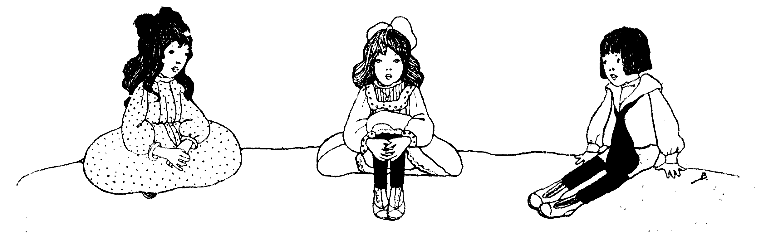 three children sitting on the ground