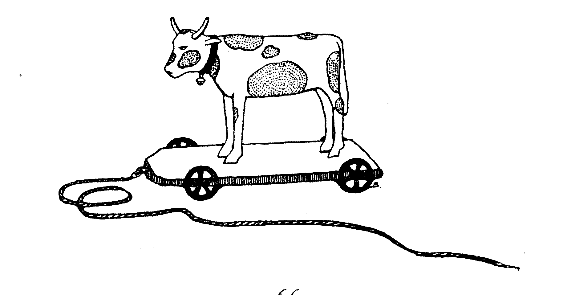 toy cow on wheels