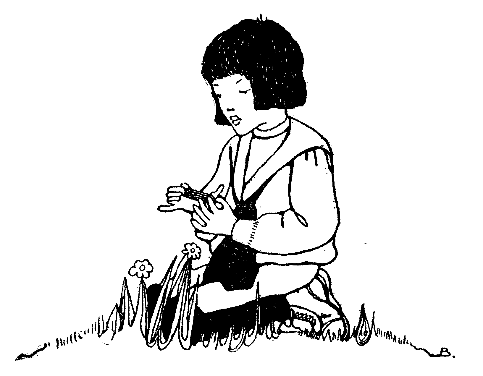child kneeling in the grass